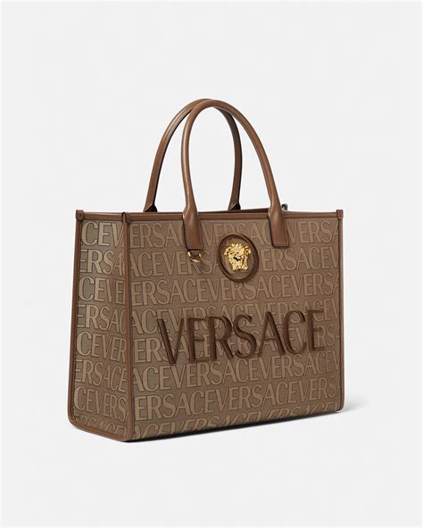 versace handle bag|Versace handbags with big zipper.